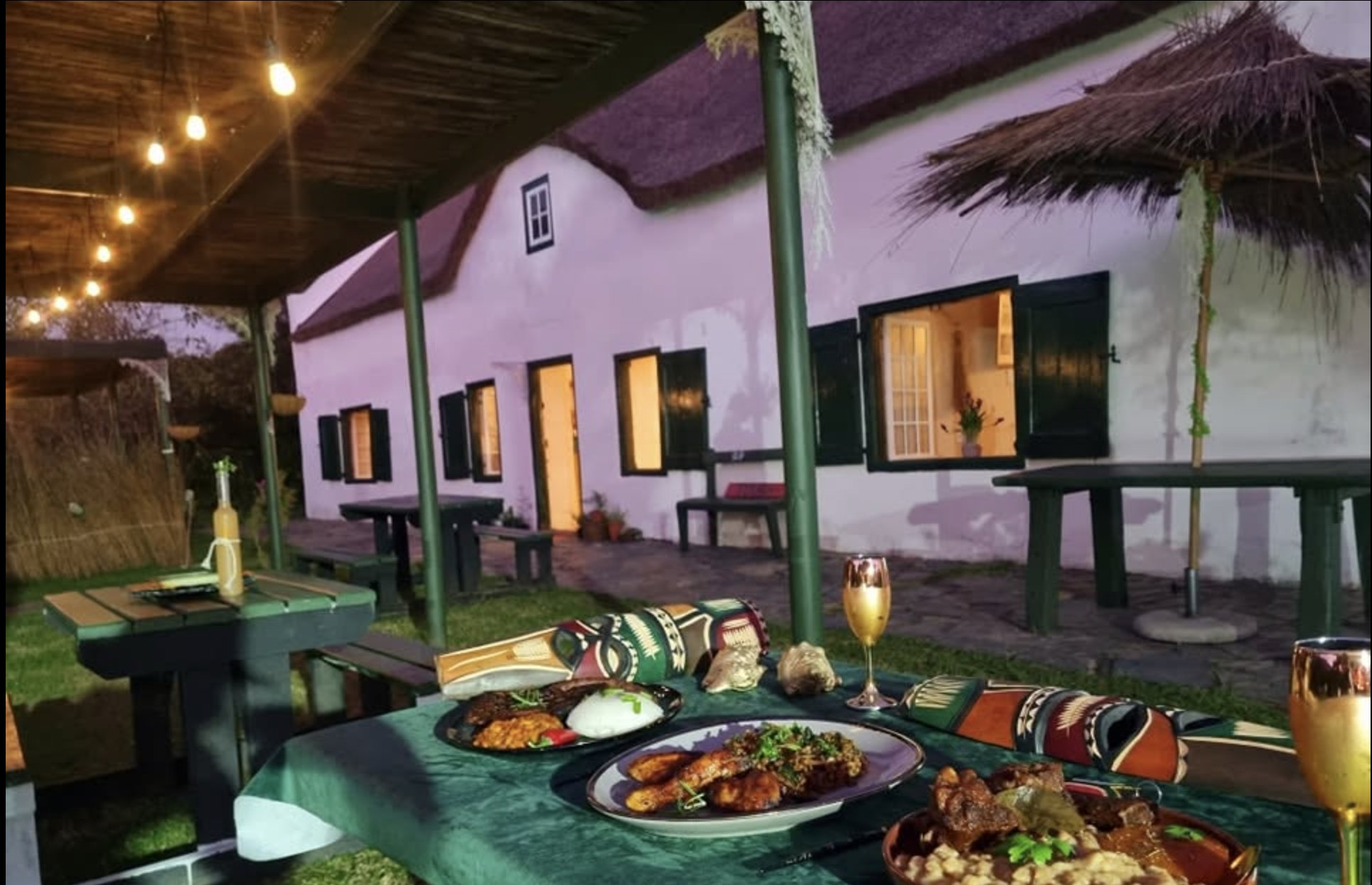Evening stoep dinner at Afrikan Prominence, a thatched heritage house in Swellendam